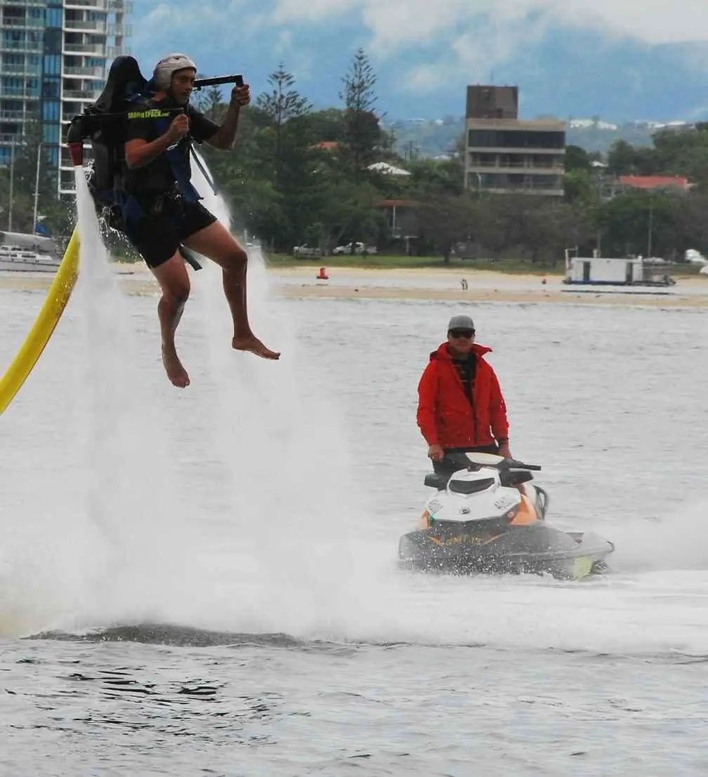 Jetpack And Jetskis E1520767536135 | Australia Travel Blog | How To Ride A Jet Pack And Flyboard On Water. Looking Like A Complete Goose, Thanks To Tripadvisor Attractions! | Australia, Flyboarding, Gold Coast, Jet Pack Water, Things To Do, Tripadvisor | Author: Anthony Bianco - The Travel Tart Blog